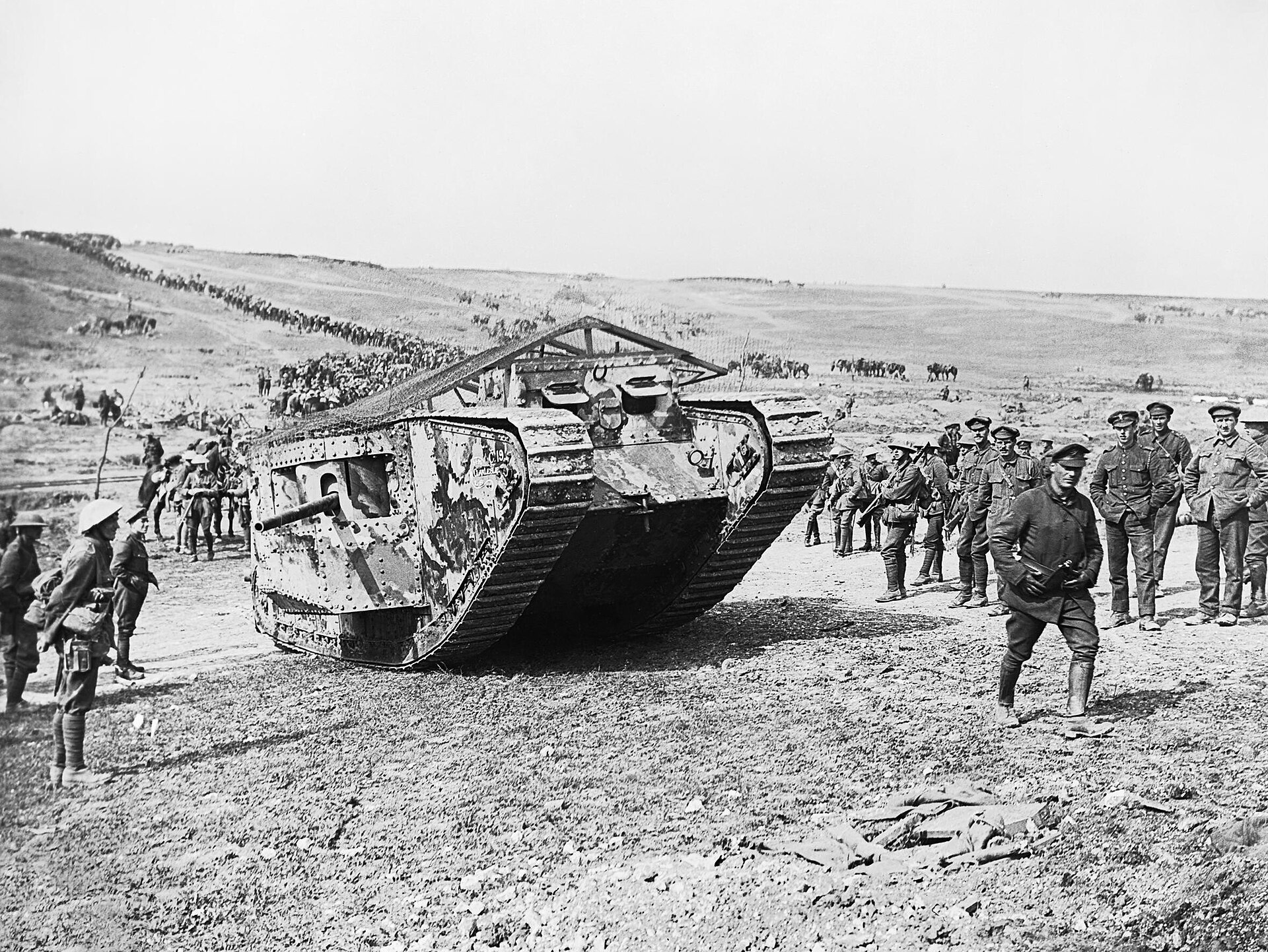 A British Mark I tank and soldiers at Flers-Courcelette